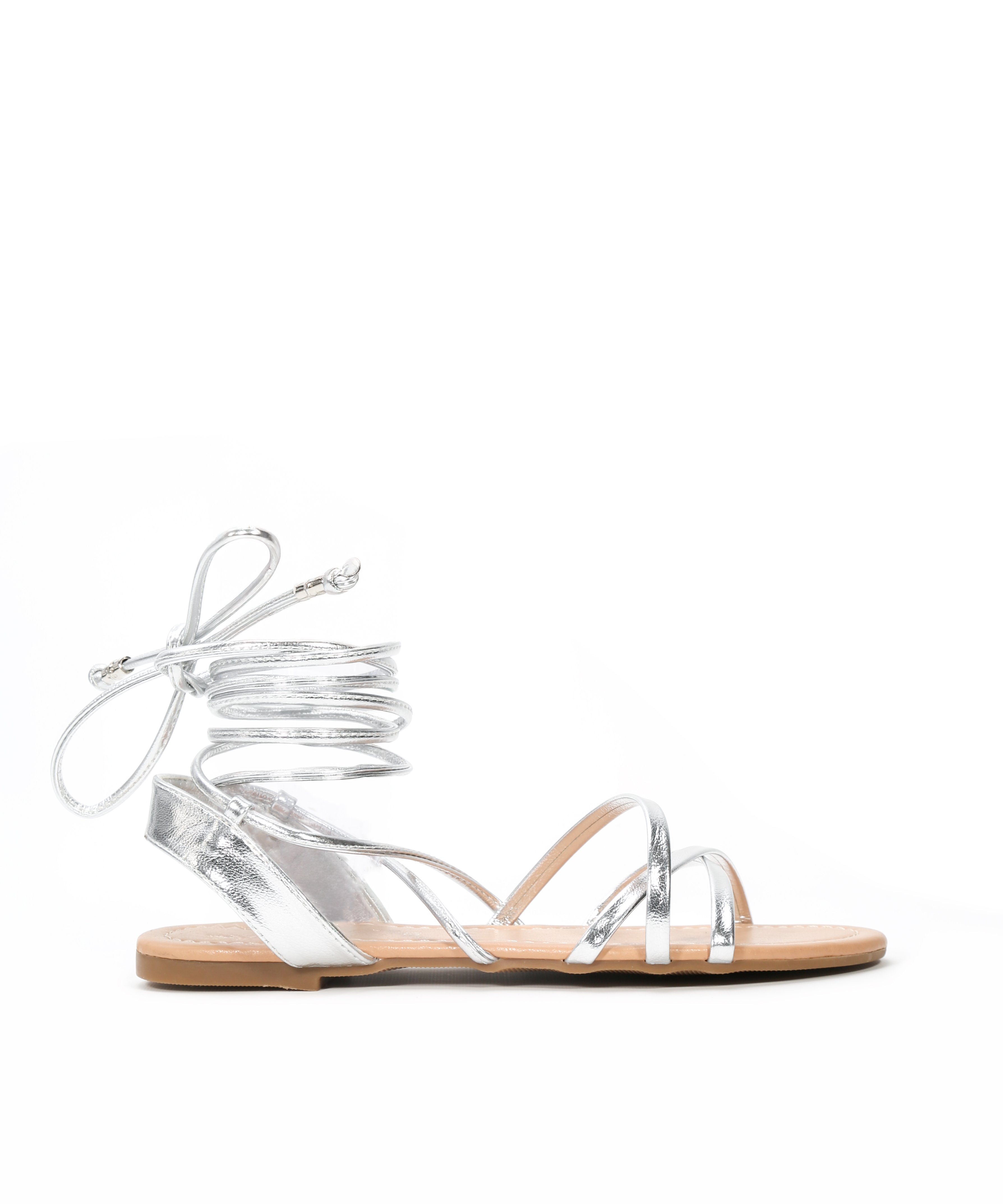 Sandalia plana atada al tobillo